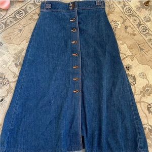 High waisted dark wash denim skirt with button detailing